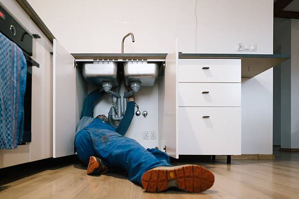Professional Drain Cleaning technician working in Wathena, KS